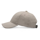 Beige baseball cap on a white background