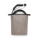 Beige carrying case with black charging cable on a white background
