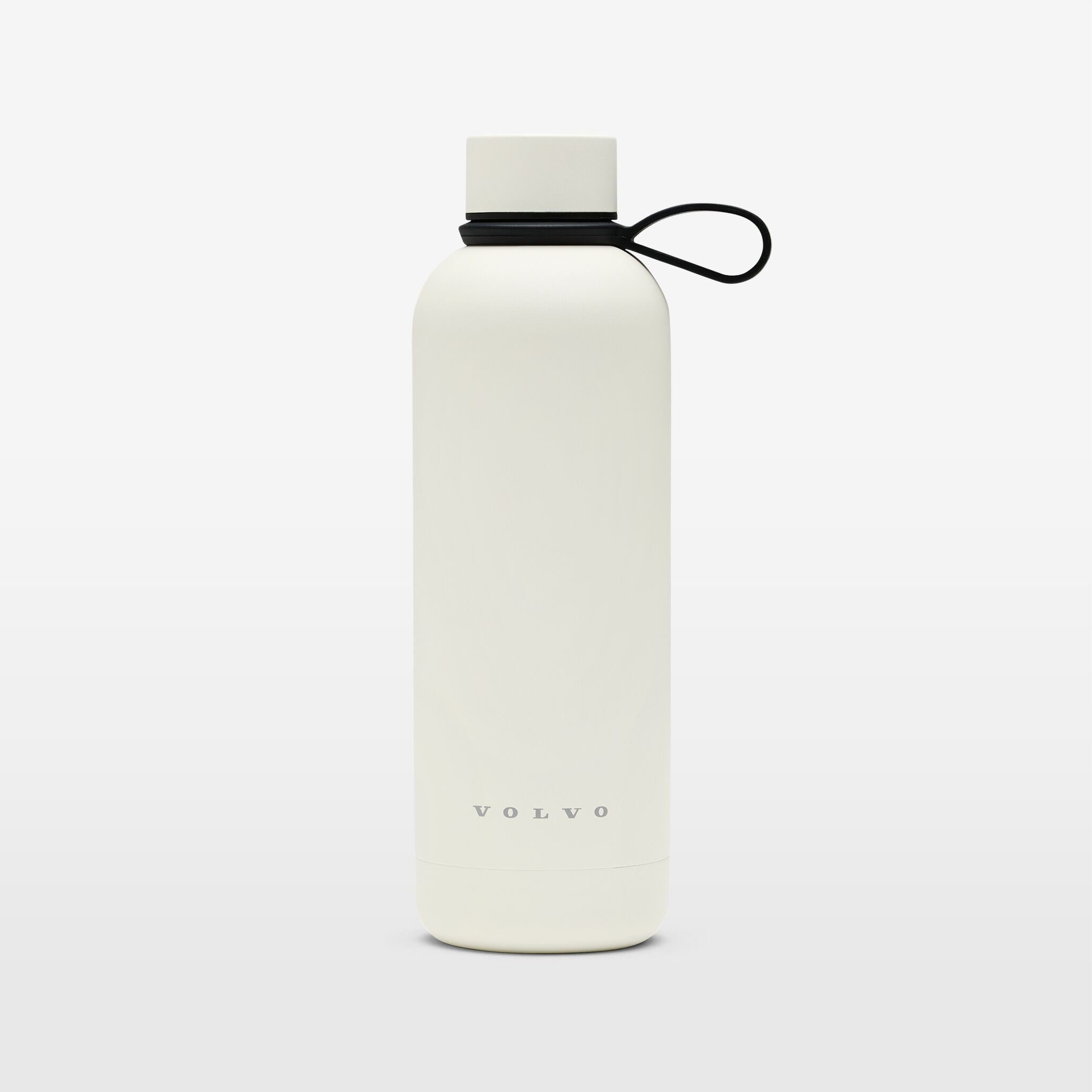 The Volvo Thermos Bottle in off-white against a white background. We see the rust-proof stainless steel design, tight sealing ring, Volvo logo near the bottom, and strap for easy carrying.