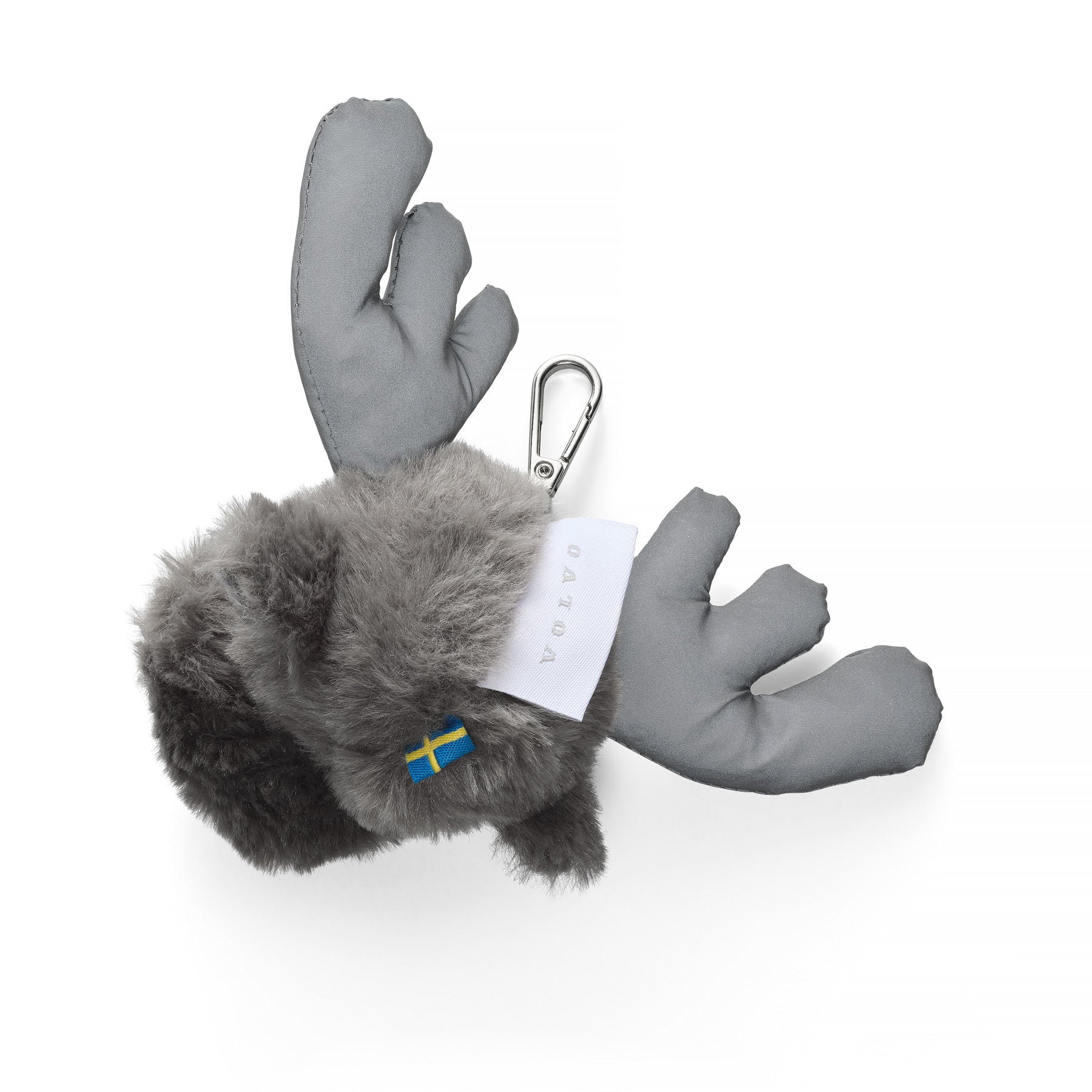 Gray plush toy with a carabiner and tag on a white background