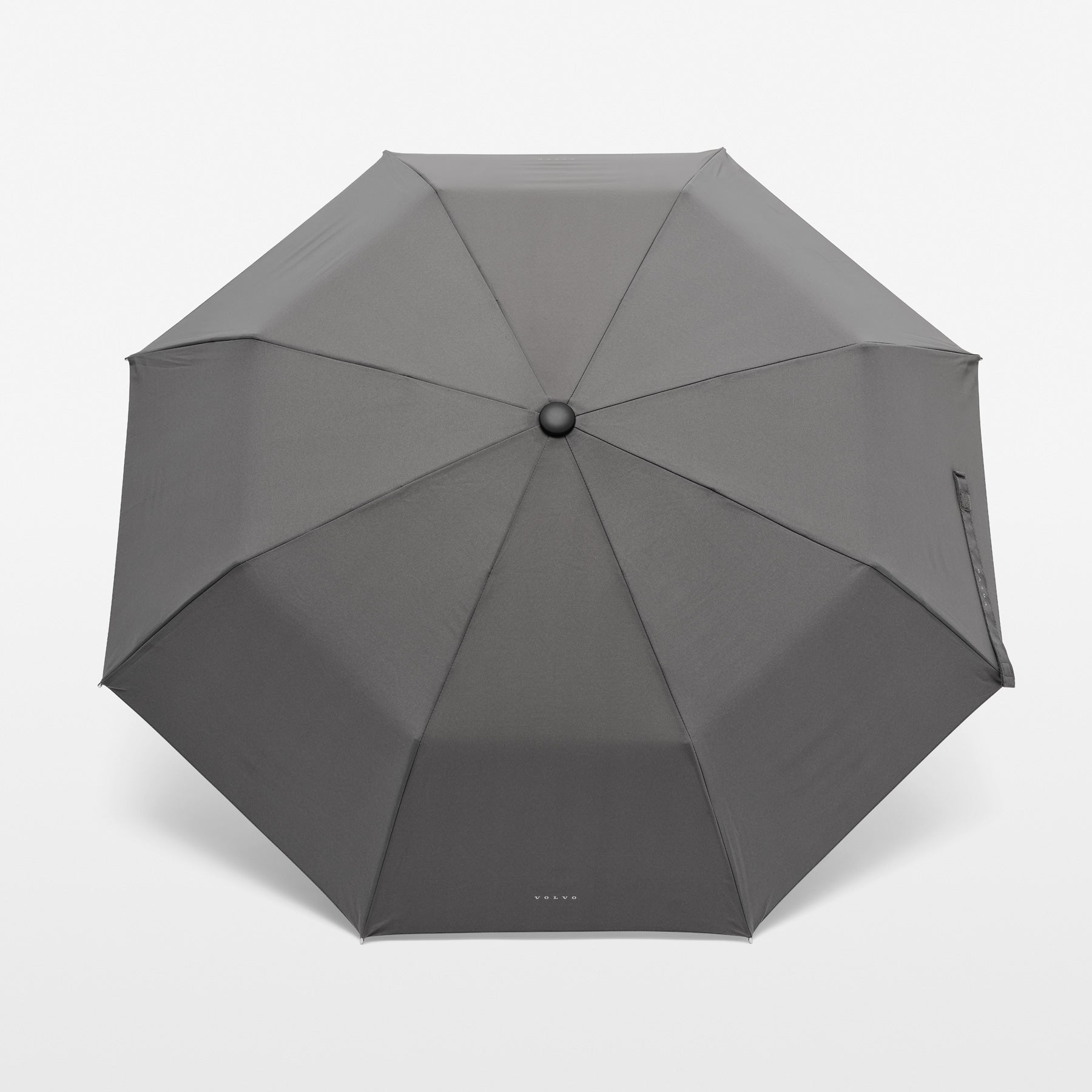 Gray umbrella on a light gray background