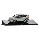 Model car on a black display stand with 'C40' branding on a white background