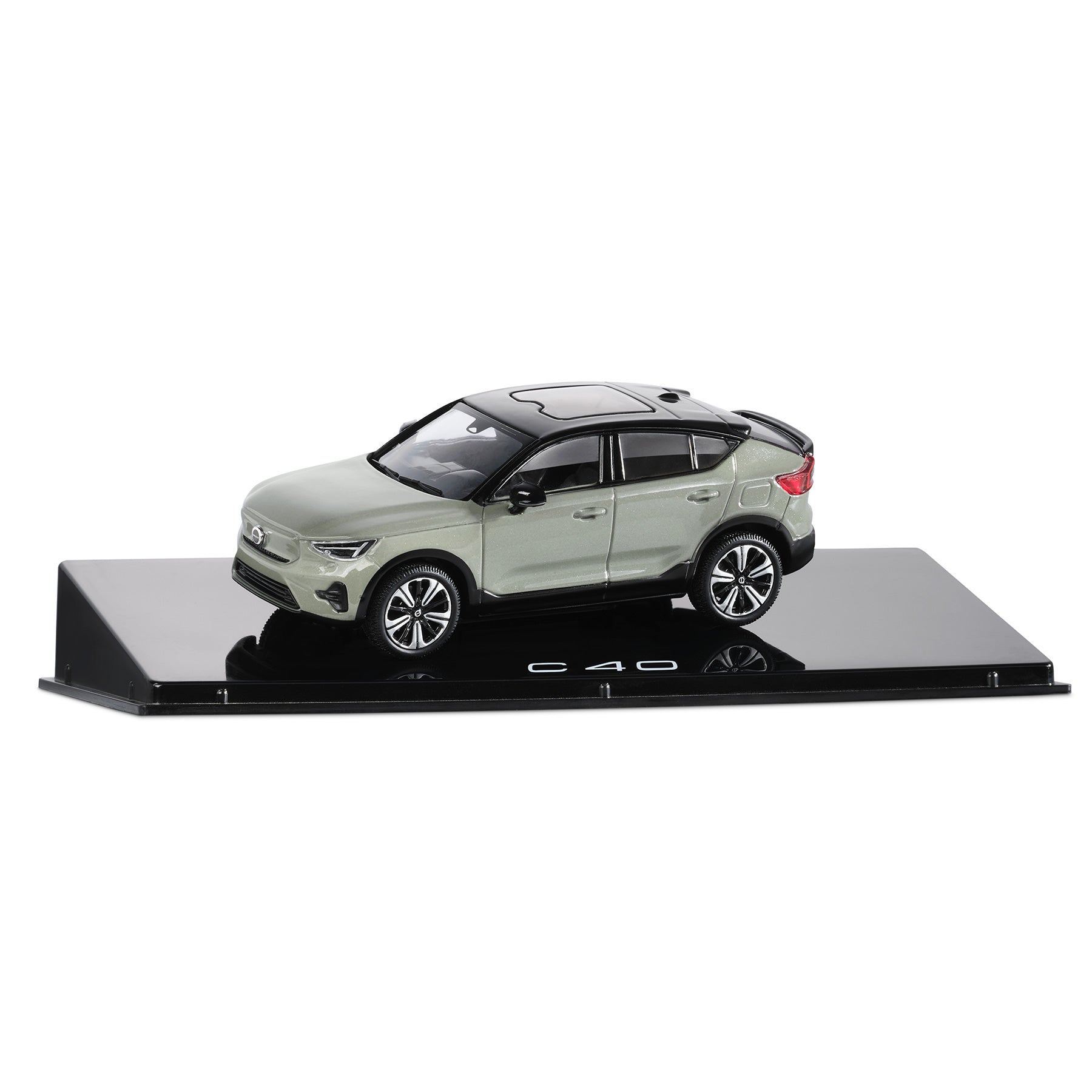 Model car on a black display stand with 'C40' branding on a white background