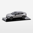 Model car on a display stand with a white background