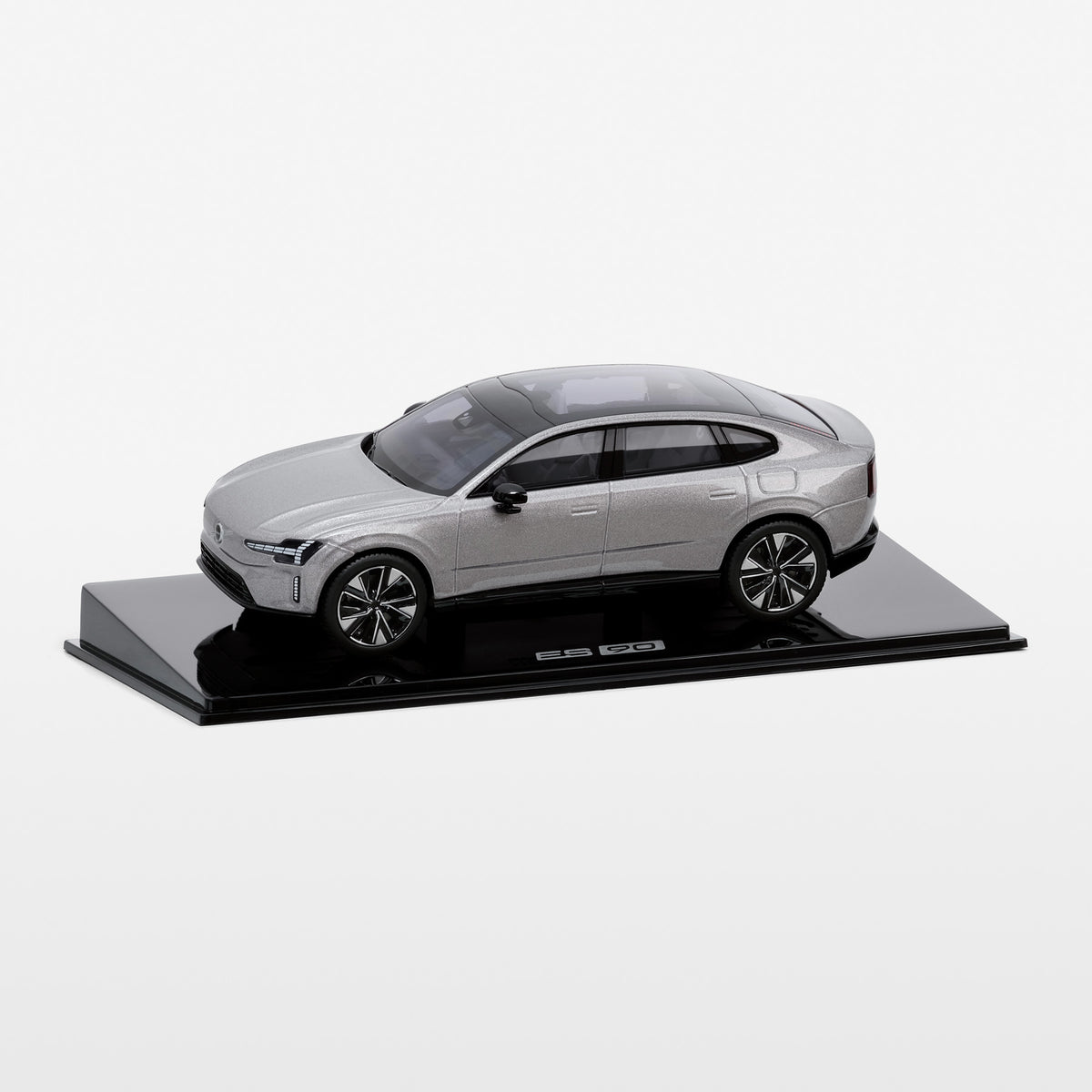 Model car on a display stand with a white background