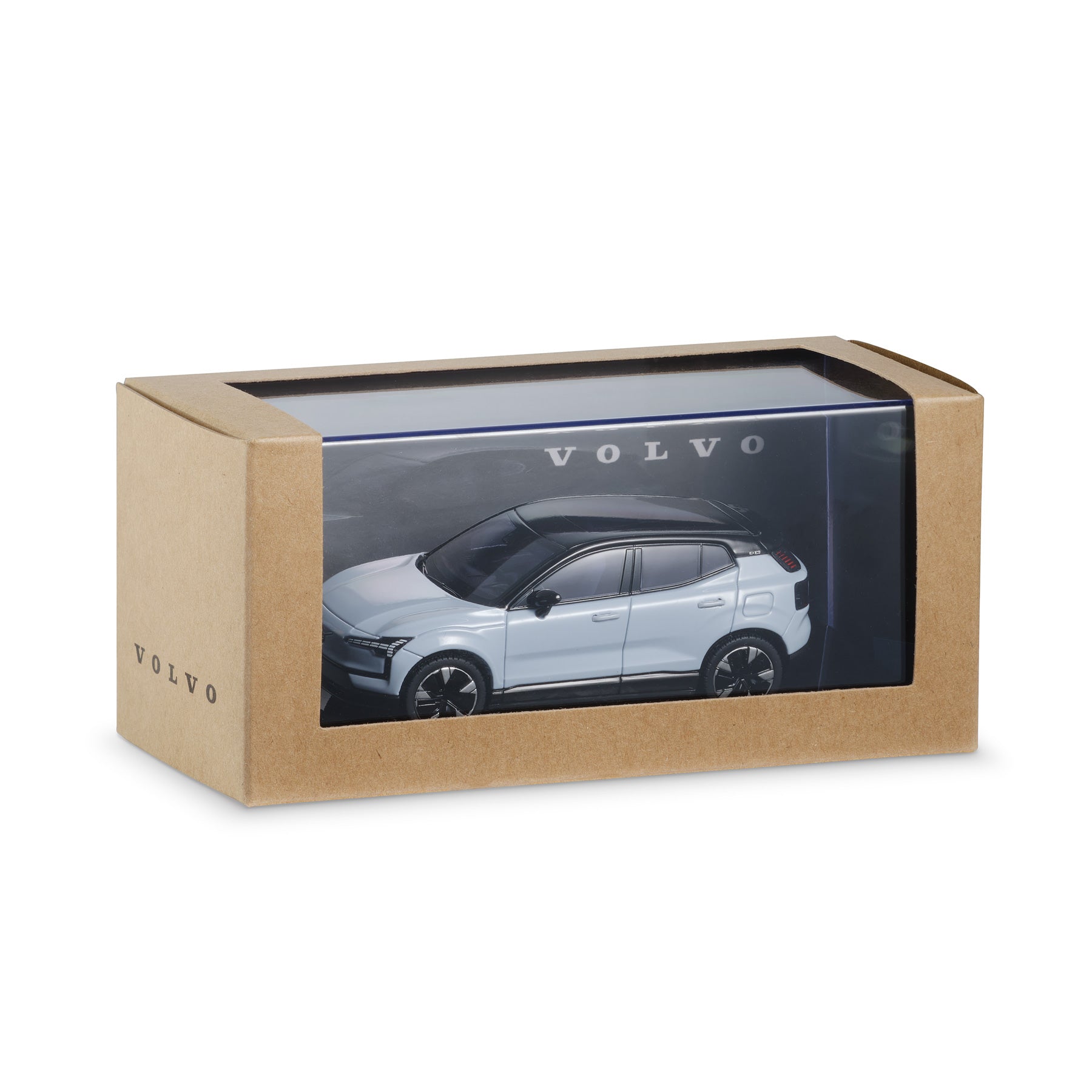 Model car in a Volvo branded box on a white background