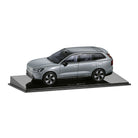 Model car on a display stand with a white background