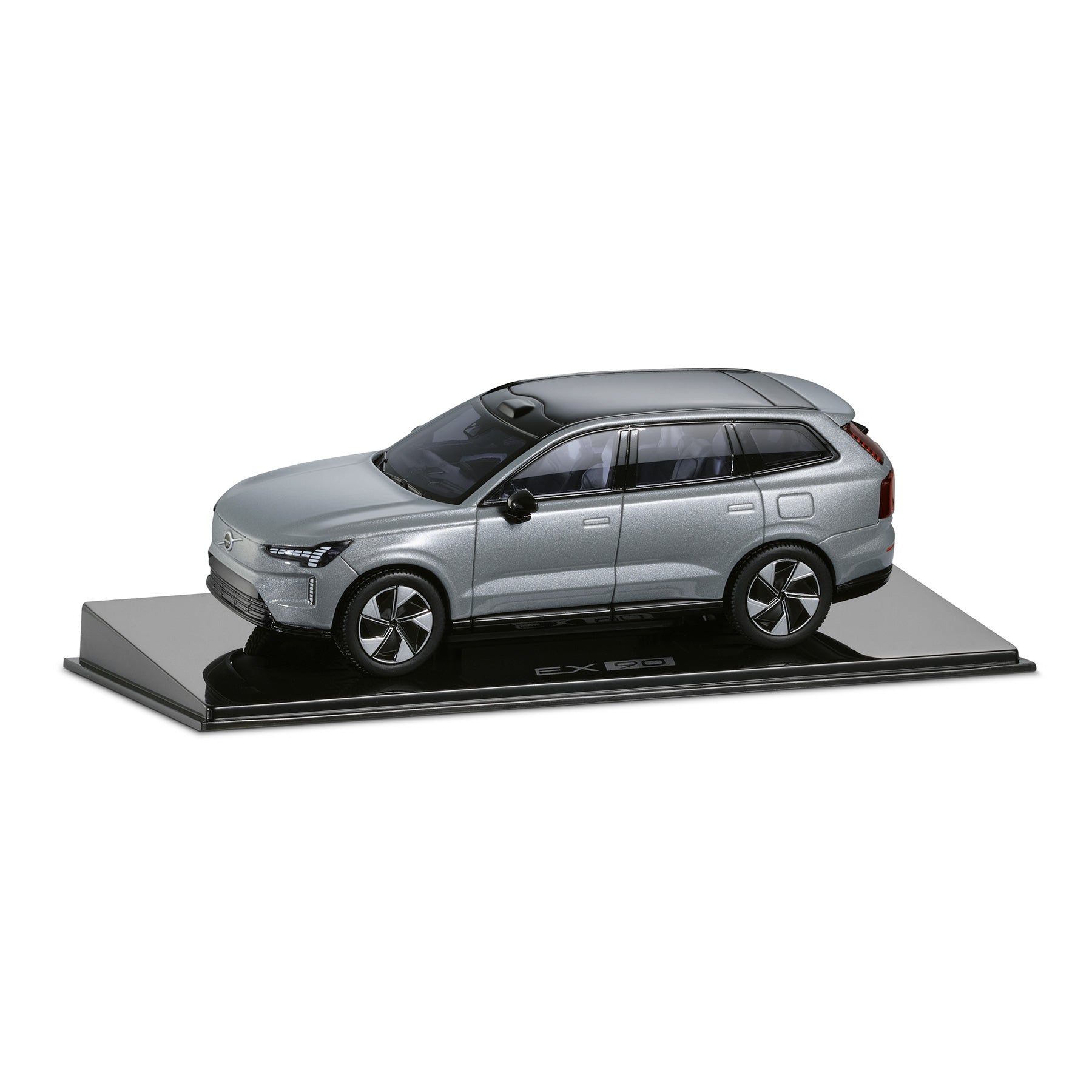 Model car on a display stand with a white background