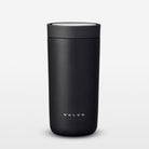 Black Volvo tumbler on a light gray background
