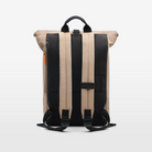 Volvo Backpack seen from the back against a white background. Visible are the black straps and handle at top. On the left is an orange puller on the storage pocket and also reinforced pocket for laptop storage.